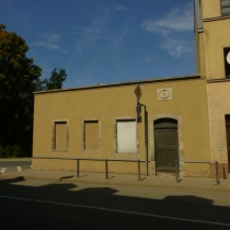 Bäckereiwappen in der Nikolaistraße in Weißenfels im Burgenlandkreis